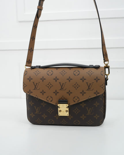 MONOGRAM REVERSE POCHETTE METIS MM