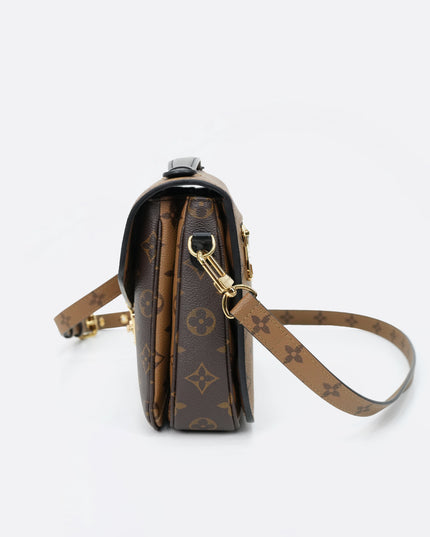 MONOGRAM REVERSE POCHETTE METIS MM