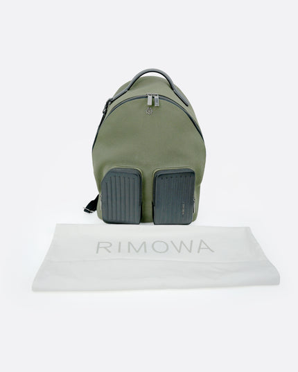 NEVER STILL BACKPACK OLIVE GREEN LEATHER-TRIMMED CANVAS