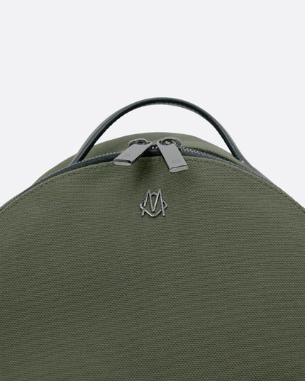 NEVER STILL BACKPACK OLIVE GREEN LEATHER-TRIMMED CANVAS