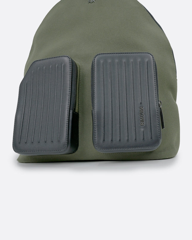NEVER STILL BACKPACK OLIVE GREEN LEATHER-TRIMMED CANVAS