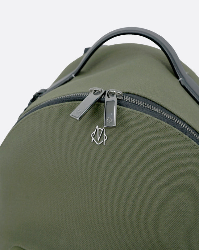 NEVER STILL BACKPACK OLIVE GREEN LEATHER-TRIMMED CANVAS