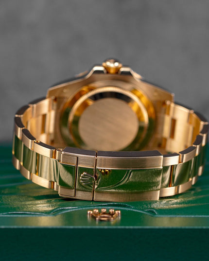 Harga Rolex GMT Master II Yellowgold Black