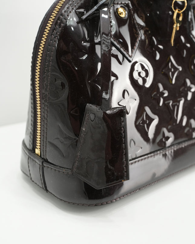 MONOGRAM VERNIS ALMA BB AMARANTE