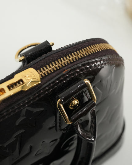 MONOGRAM VERNIS ALMA BB AMARANTE